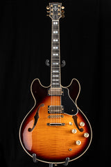 Yamaha SA2200-OVS Semi-Hollow guitar in Violin Sunburst. Features include dual humbucker pickups, gold hardware, f-holes, and a black pickguard. The neck has block inlays and a glossy finish.