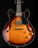 Yamaha SA2200-OVS Semi-Hollow guitar in Violin Sunburst. Features include dual humbucker pickups, gold hardware, f-holes, and a black pickguard.
