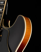 Yamaha SA2200-OVS Semi-Hollow guitar in Violin Sunburst, featuring a glossy finish, cream binding, and visible wood grain on the body.