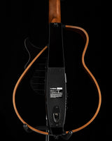Yamaha SLG200S Silent Guitar in Trans Black, featuring a sleek, modern design with a detachable frame and control panel on the back.
