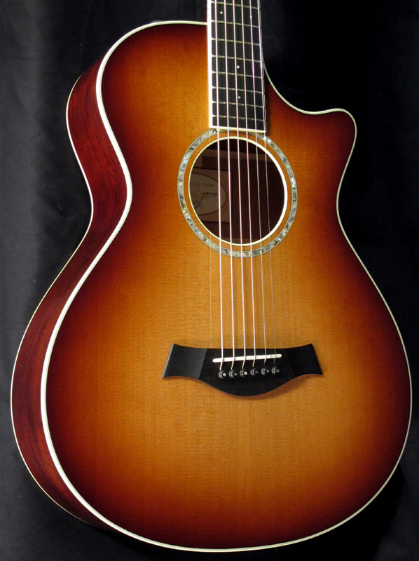 Taylor 12 Fret CE Mahogany acoustic guitar.